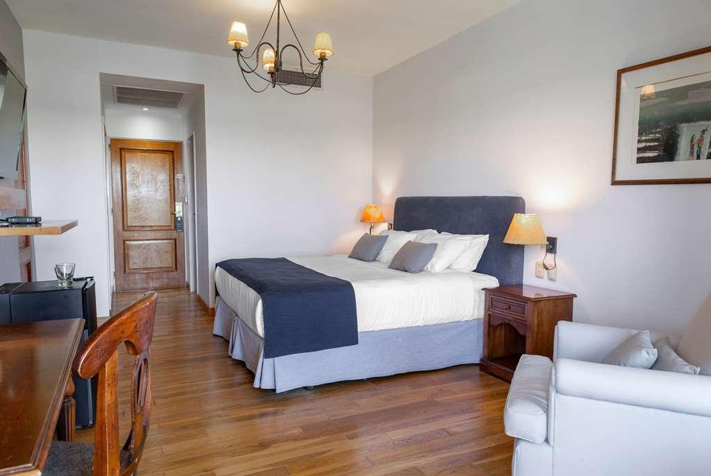 Wyndham Garden Lujan Hotel Стая снимка